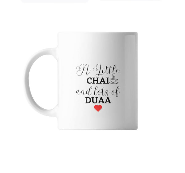 White ceramic coffee mug with the text 'A Little Chai and Lots of Duaa' in elegant black script, featuring a small illustration of a steaming cup of chai and a red heart at the bottom.