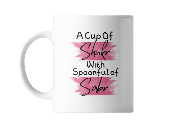A Cup of Shukr with a Spoonful of Sabr" coffee mug with an elegant design and comfortable handle.