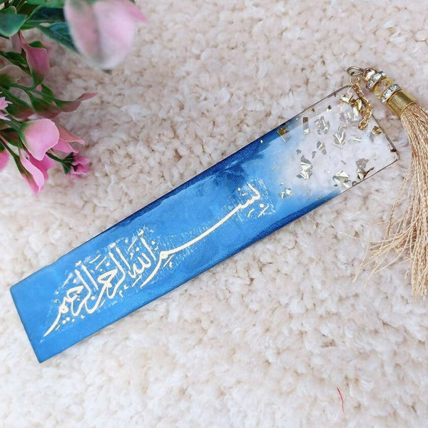 Customizable Bismillah Bookmark with elegant calligraphy, designed as an Islamic reading accessory. The bookmark features the phrase 'Bismillah' in artistic script, making it both a functional tool and a spiritual reminder for daily use.